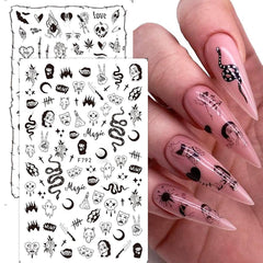 YKZFUI mixed skull and snake nail designs showing styling versatility