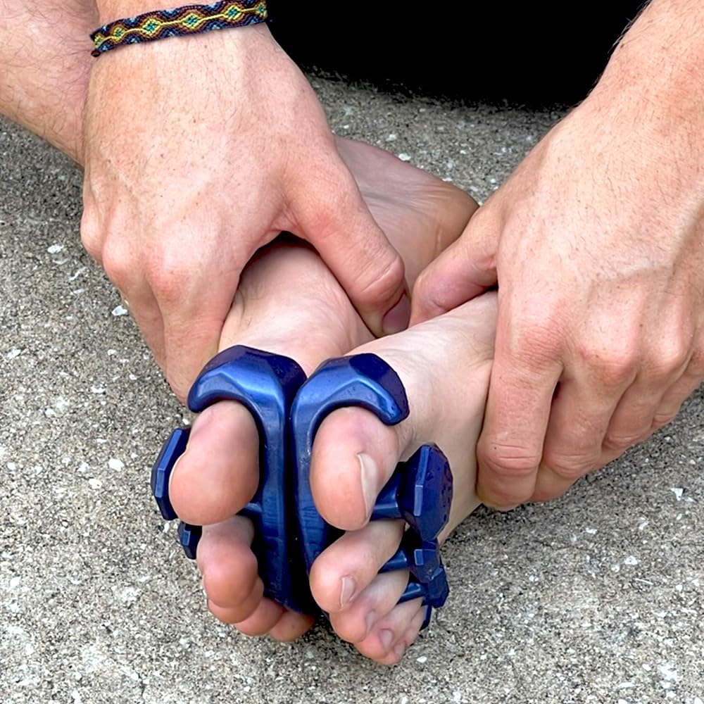 YogaToes Gems for Men beside ruler showing size for men shoe size 7 and up
