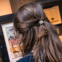 YOHAMA clip used in a braided hairstyle adding discreet hold
