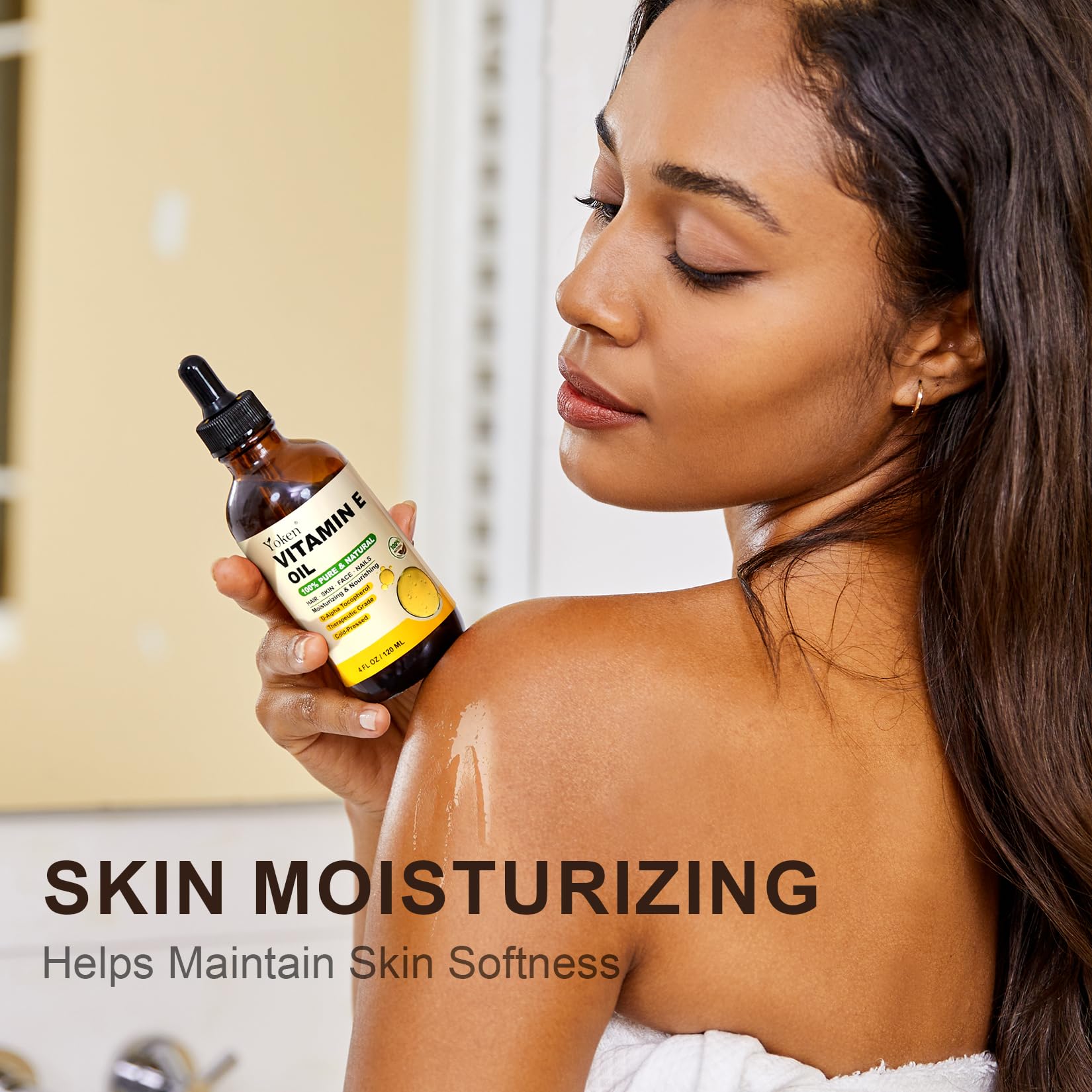 Applying Yoken oil to face for targeted moisturizing and healthy glow