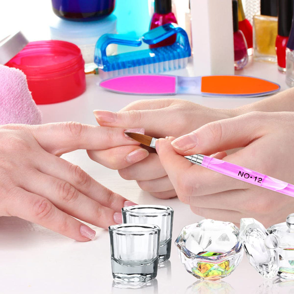 Yokilly brush painting a fine nail tip for detailed nail art
