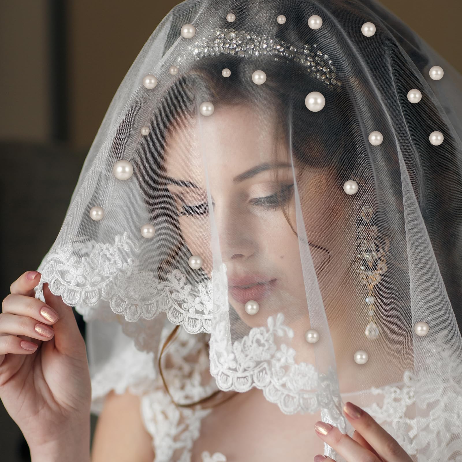 Yolev bridal updo with pearl pins in hair demonstrating secure, decorative hold