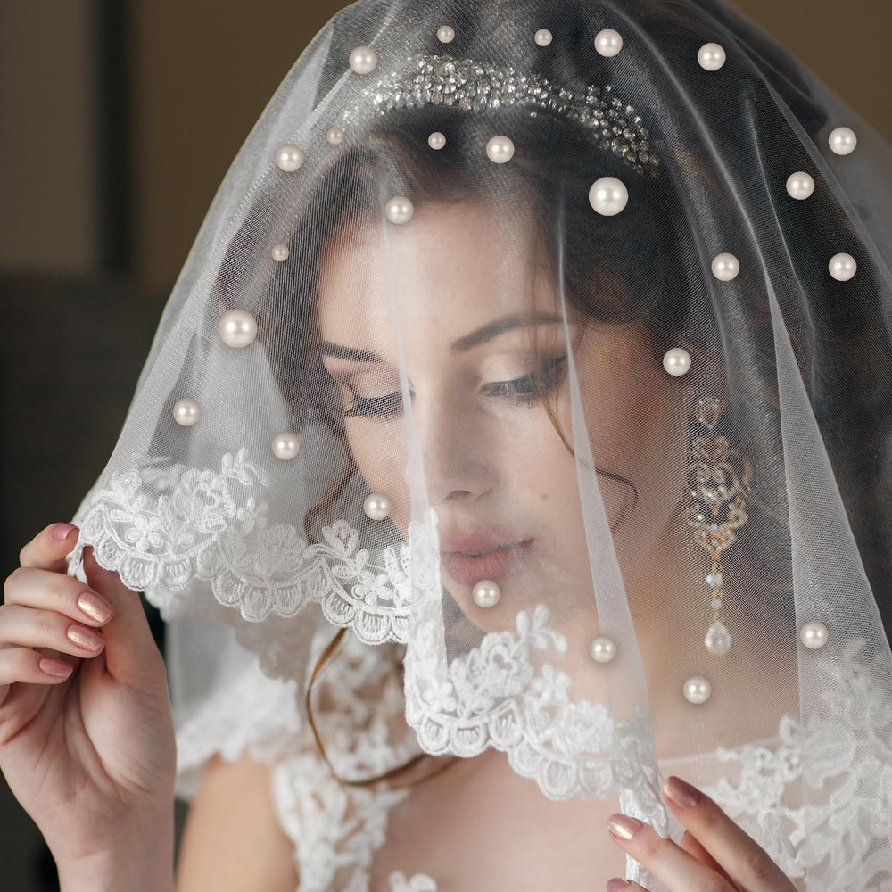 Yolev bridal updo with pearl pins in hair demonstrating secure, decorative hold