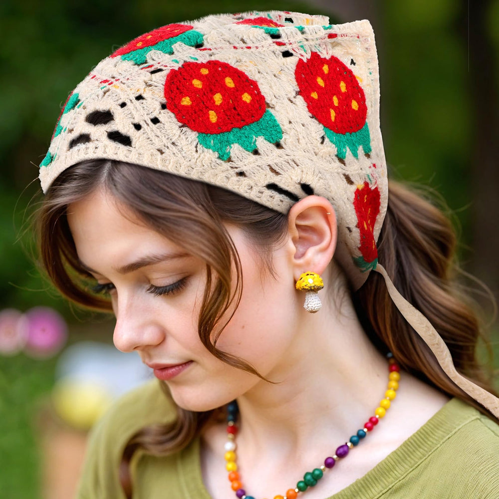 Yolev bandana held in hands showing actual size and adjustable fit