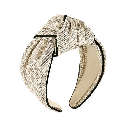 Yonchic front view beige headband shows clean knot and flattering silhouette