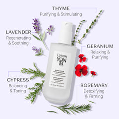 Yonka bottle on bathroom vanity staged with skincare items to inspire daily routine
