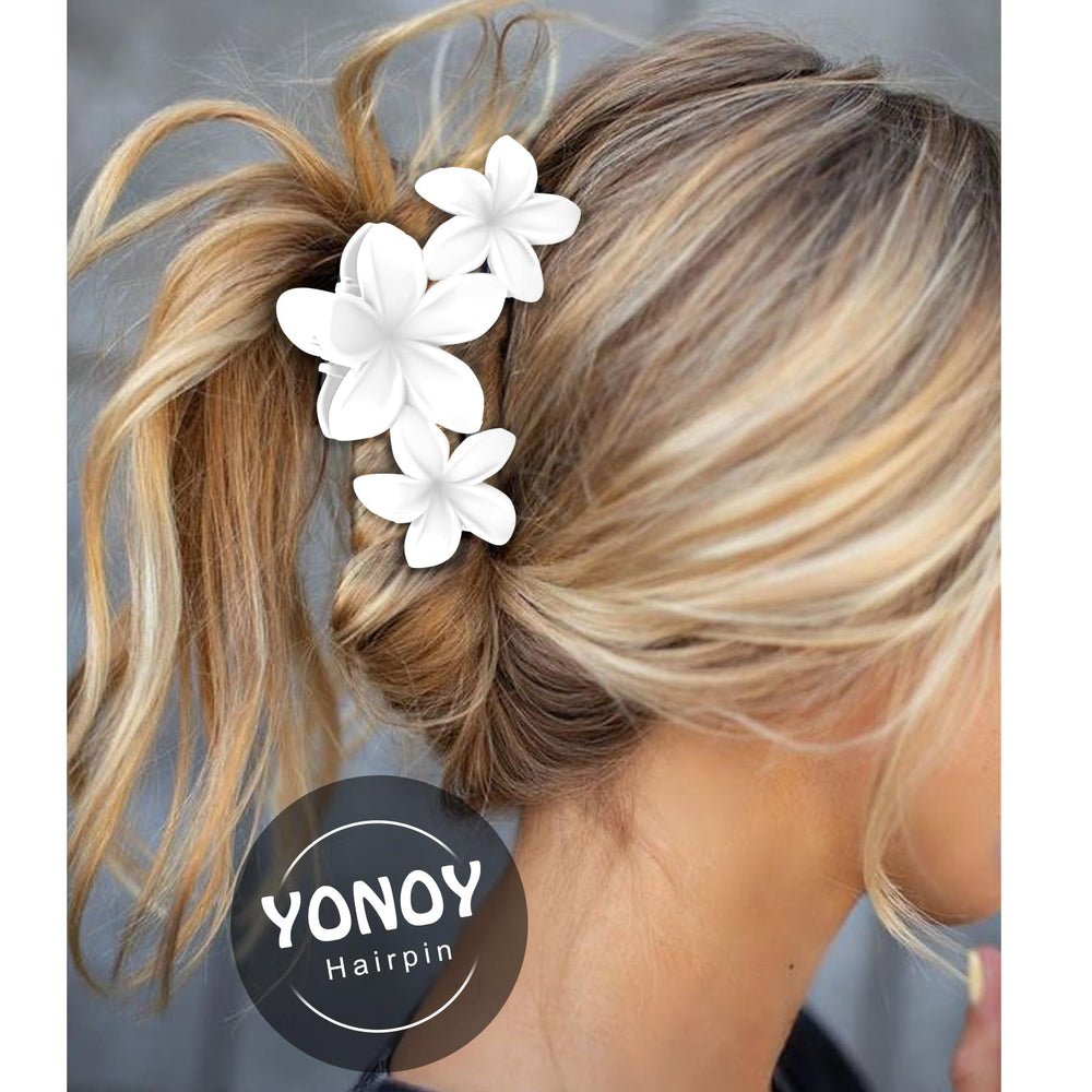 YONOY styled in a beach updo demonstrating tropical look and staying-in-place benefit