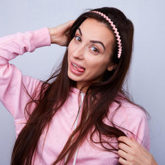 YONOY model wearing headband while styling hair showing comfortable fit benefit