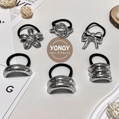 YONOY model wearing ponytail with silver tie, polished everyday look
