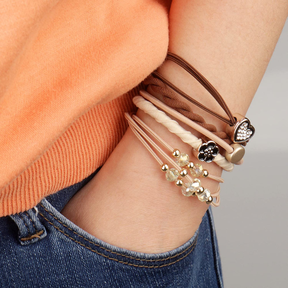 YONOY styled as wrist bracelet on model highlighting practical fashion benefit