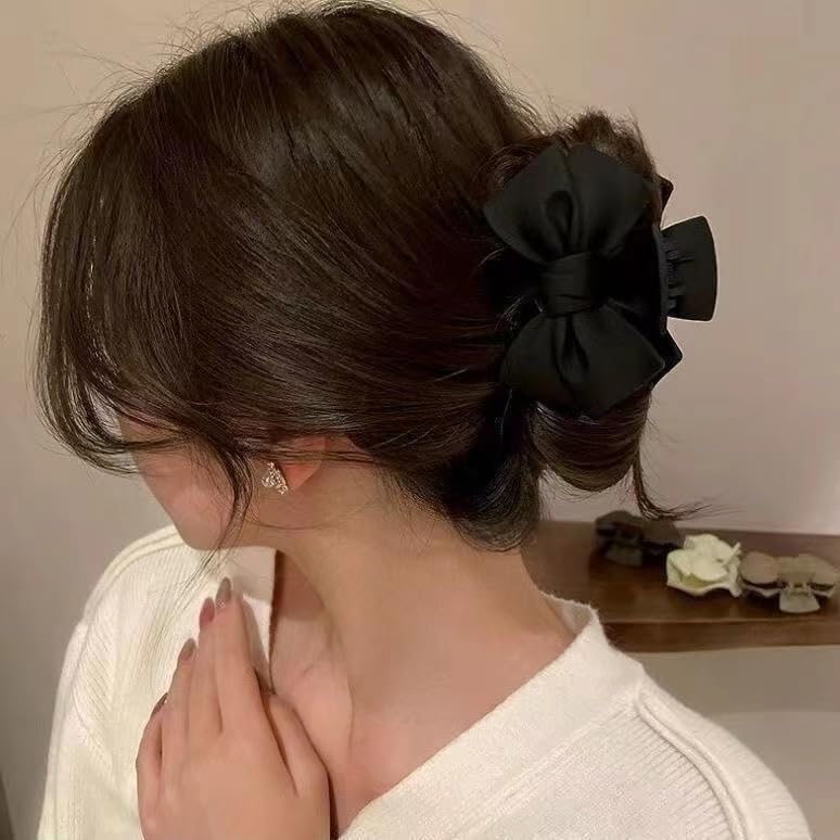 YOOOYOOO clip securing curly hair in an updo for all-day stability benefit