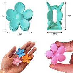 YosaiHom clips held in hand for scale showing compact 1.37 inch size