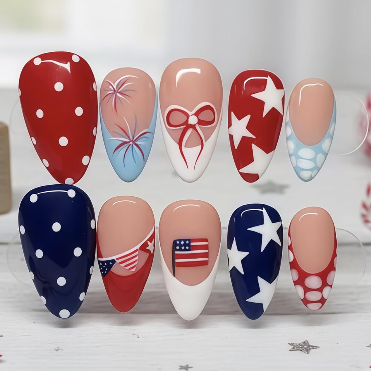 YUEJIMEIGUI front packaging showing 24-piece Independence Day nail kit for convenience