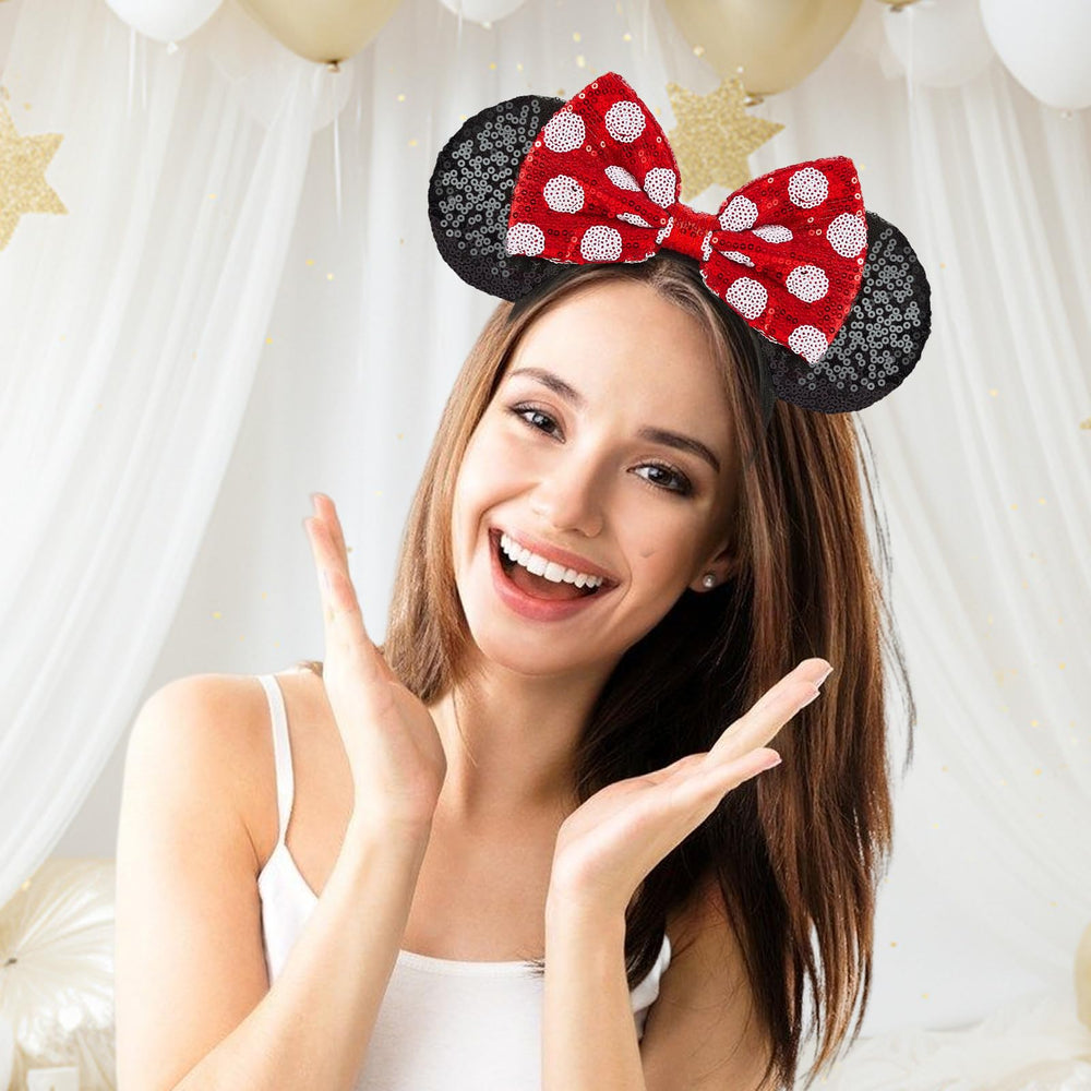 YUNISS headband next to adult hand showing one-size stretch and fit