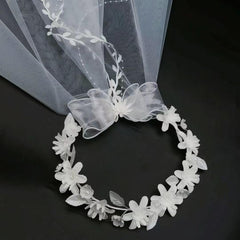 yuruyi front view of flower crown and veil highlighting bridal-ready styling