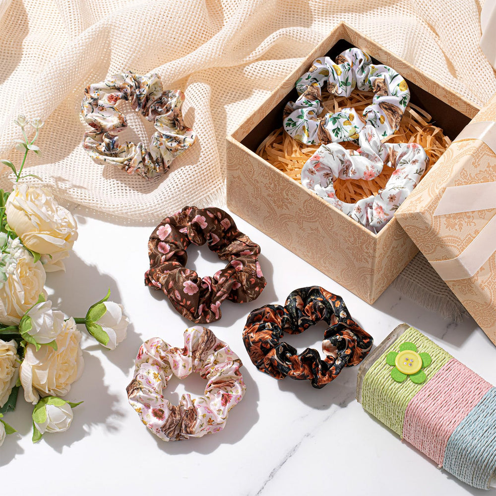 Yuxung scrunchie in hand showing 11 cm diameter for sizing clarity