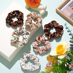 Yuxung scrunchie worn in ponytail demonstrating secure comfortable hold