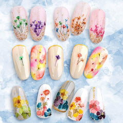 YWLI nails in progress with flowers applied showcasing easy placement and visual impact