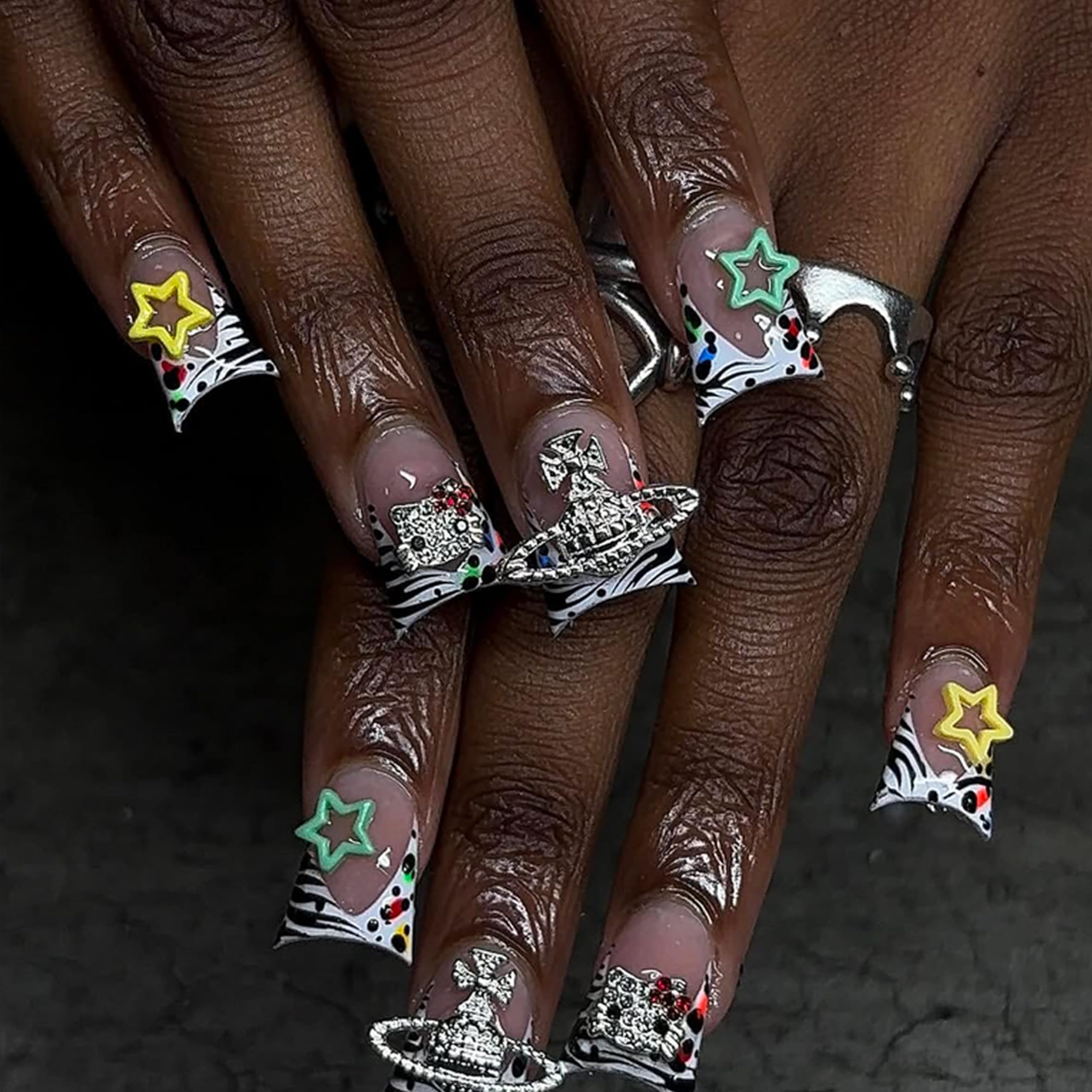 ZAKCBEAUR pink heart charm detail offering a cute accent for Y2K nail looks