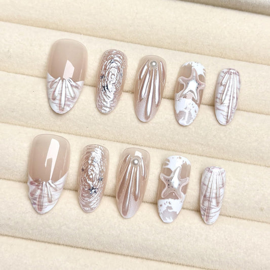 ZASKHLD close-up of 3D pearl and seashell details highlighting textured decoration