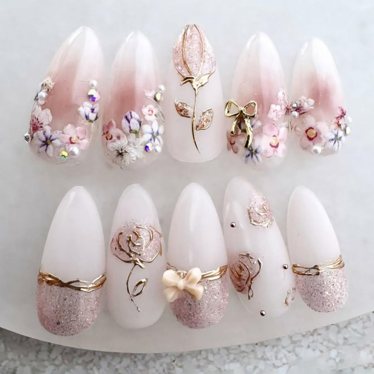 ZASKHLD front packaging showing 24-piece pink floral press-on nails and kit benefits