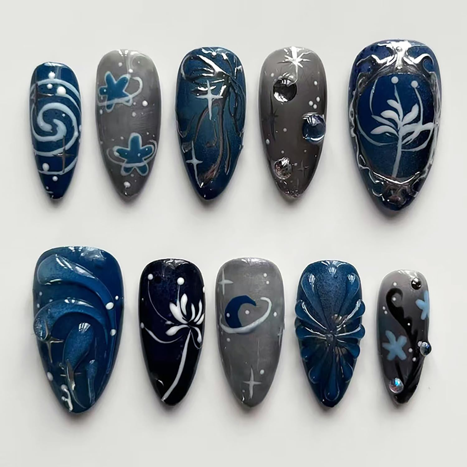 zaskhld front packaging showing dark blue almond press-on nails with 3D accents for instant style
