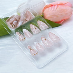 ZASKHLD press-on nails being applied showing simple stick-on application