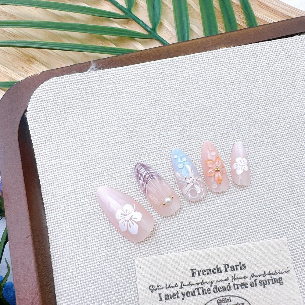 ZASKHLD nails on fingers for size comparison showing available 12 sizes