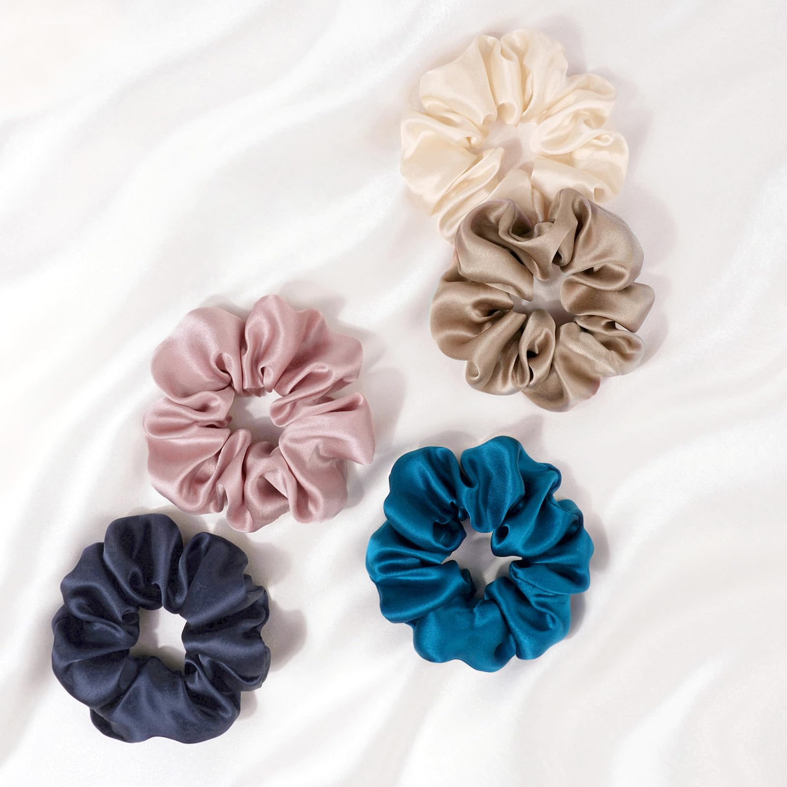 Zenssia color variation flatlay of black navy silvergrey offering styling options