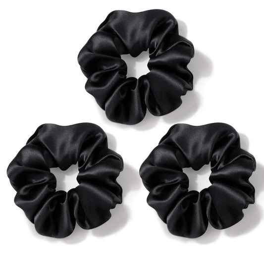 Zenssia front view of three black silk scrunchies showing elegant presentation and protection
