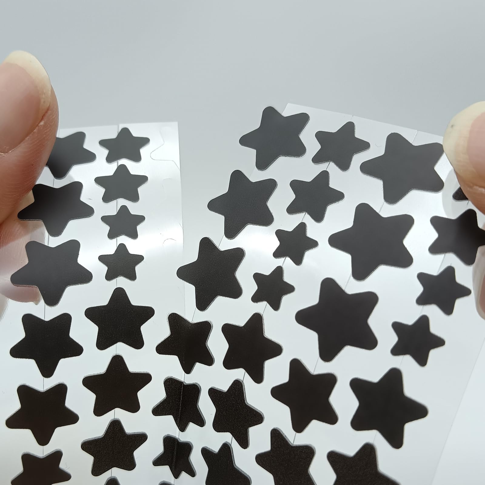 ZHAOLIESM hand holding patches to show scale and portability benefit
