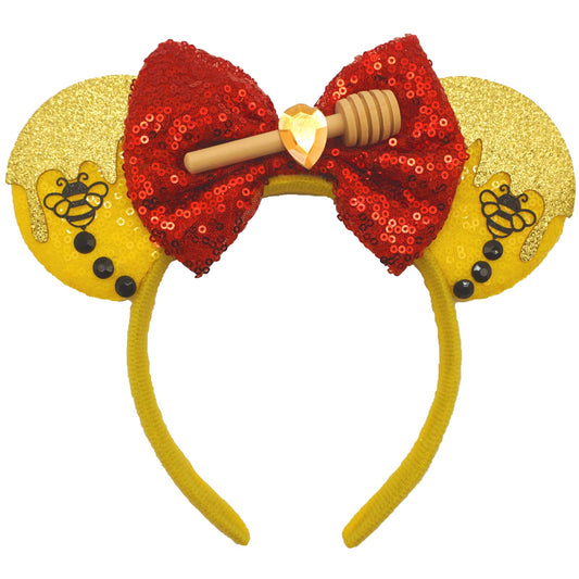 ZHENNAN bear headband front view showing playful bow and comfortable wrap