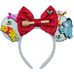 ZHENNAN headband front view showing glitter ears and bow, adds playful sparkle