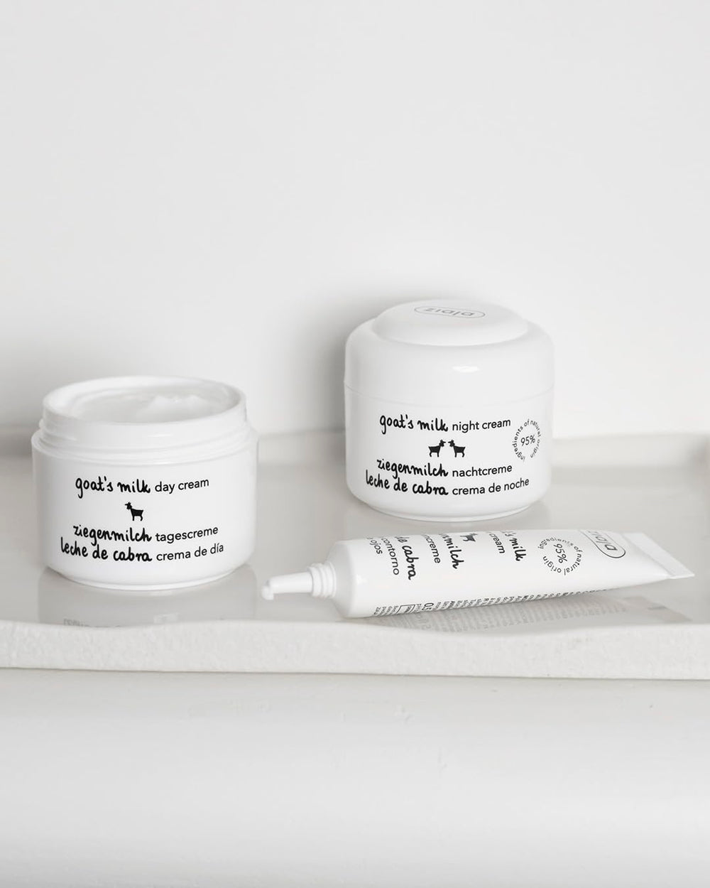 Ziaja goat's milk cream in hand scale view illustrating 50 ml size and travel-friendly benefit