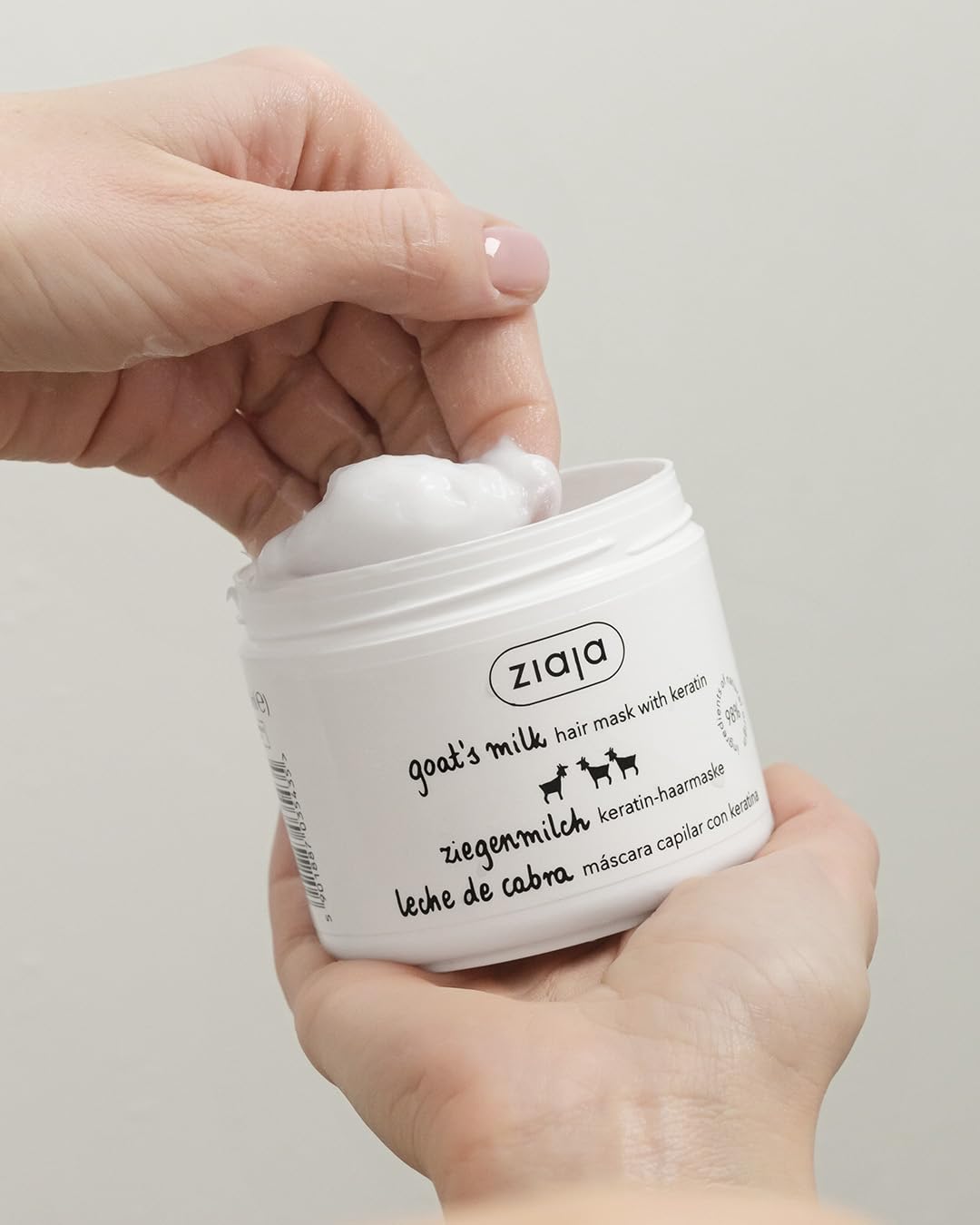 Ziaja product applied to damp hair in shower for easier detangling