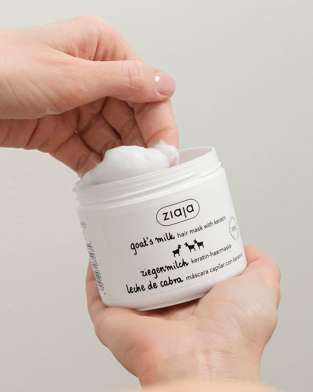 Ziaja product applied to damp hair in shower for easier detangling