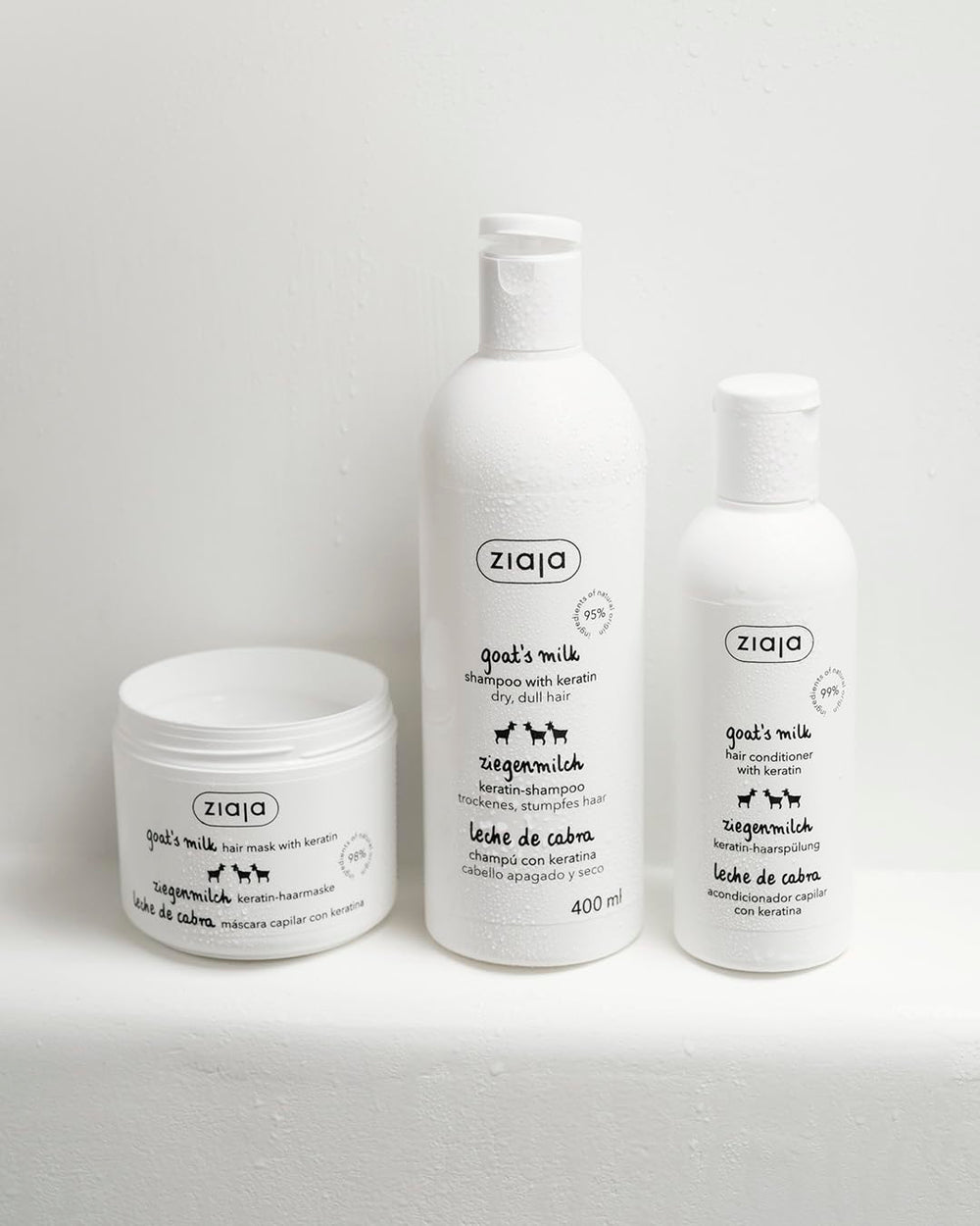 Ziaja 200ml jar beside hand to show size and travel-friendly benefit