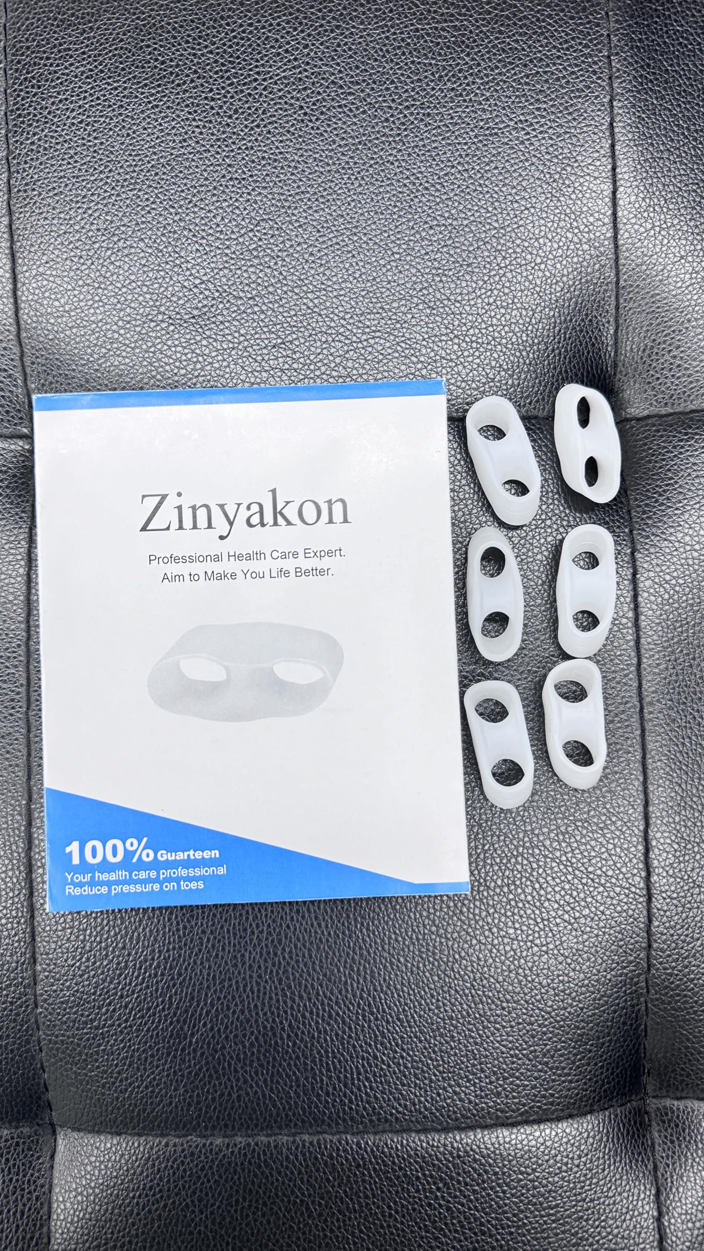 Zinyakon washable easy care rinsed under water demonstrating simple cleaning and reuse