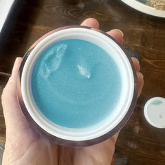 Zo-SKIN HEALTH polish being applied to hand demonstrating gentle buffing benefit