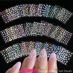 Zoance water-transfer decal being applied for smooth, seamless nail design