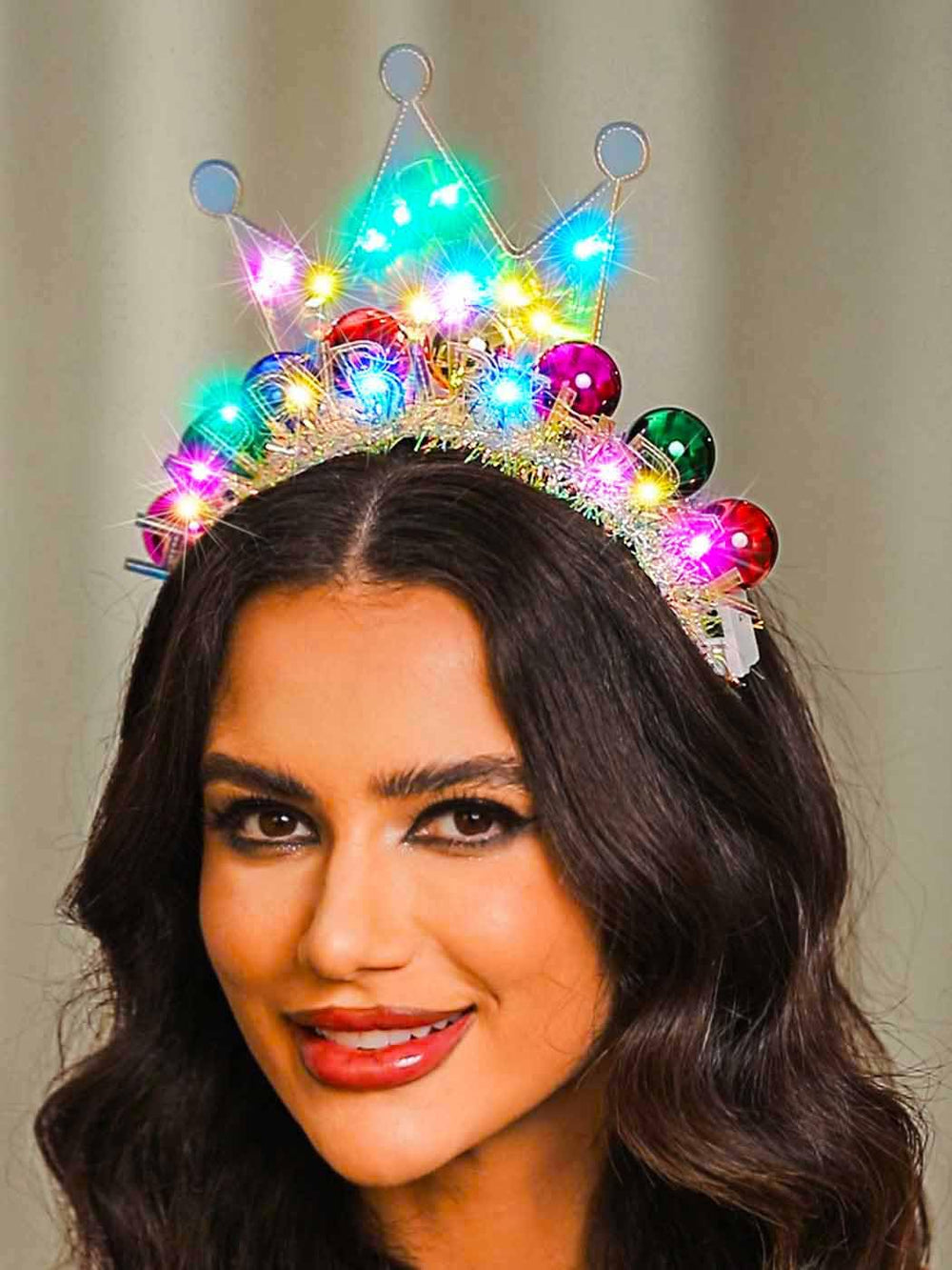 Zoestar headband held in hand showing compact size and portability