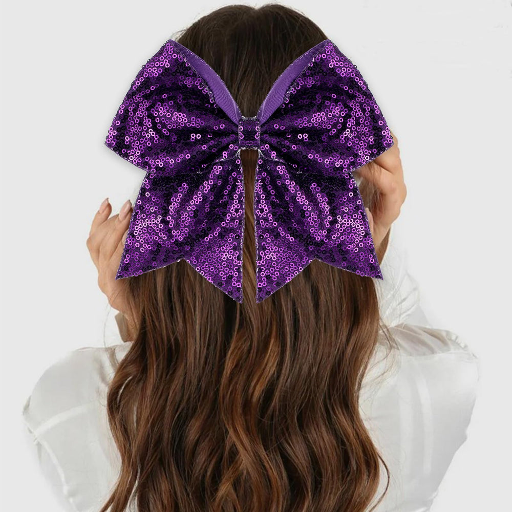 Zolyco bow worn with cheer uniform showing cohesive team look