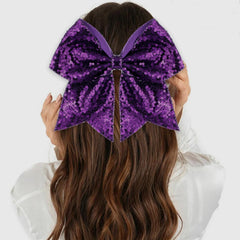 Zolyco bow worn with cheer uniform showing cohesive team look