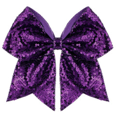 Zolyco dark purple bow front view showing dramatic sparkle and team-ready style