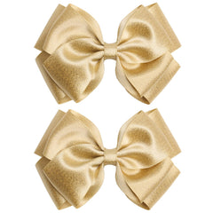 Zolyco front view gold bow set showing elegant design and gift-ready appeal