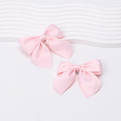 zolyco lifestyle shot with bow complementing a girl's outfit