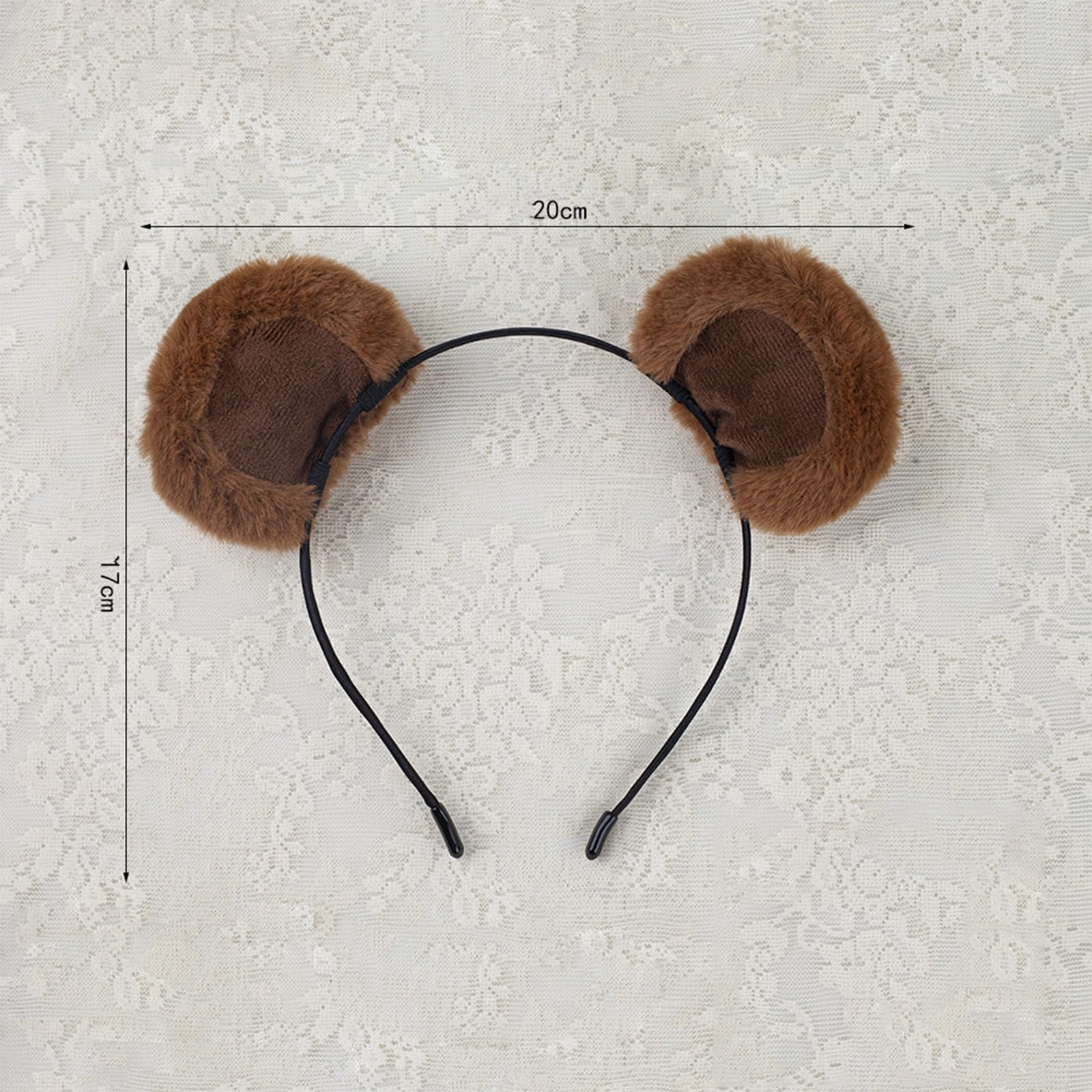 ZOONAI headband beside a ruler for scale showing one-size fit benefit