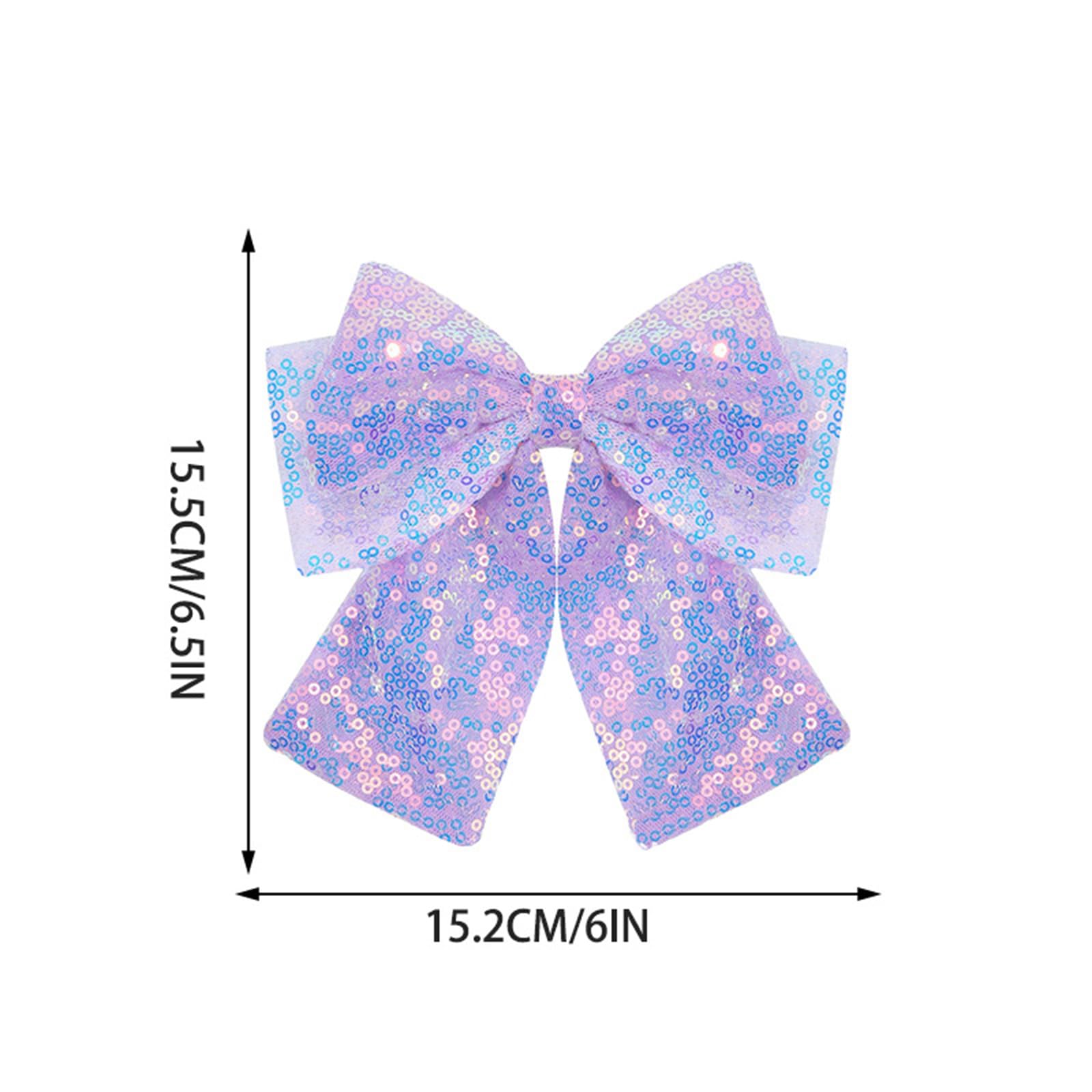 ZOONAI bow next to adult hand illustrating compact size and lightweight benefit