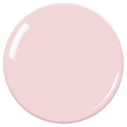 ZOYA Bela swatch on fingernails showing sheer milky pink for a natural look