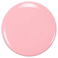 ZOYA Joey swatch on toes in sunlit scene highlighting wearable warm pink tone